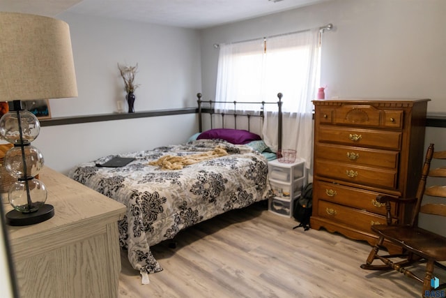 bedroom featuring light wood-type flooring