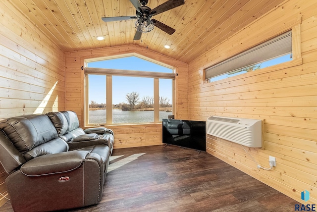 sitting room with wooden walls, dark wood-type flooring, wood ceiling, lofted ceiling, and a ceiling fan