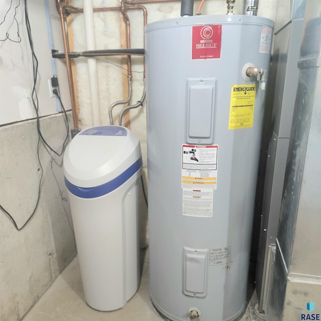 utility room featuring water heater