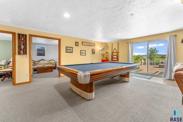 game room with carpet flooring, baseboards, a textured ceiling, and billiards