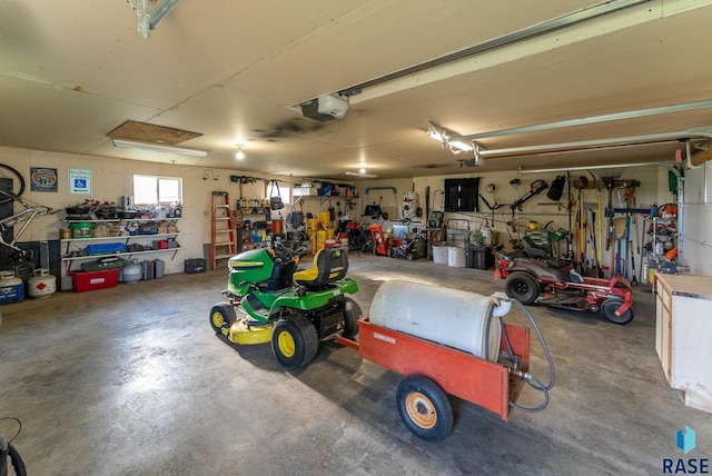 garage featuring a workshop area and a garage door opener