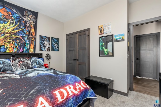 carpeted bedroom with baseboards