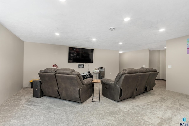 carpeted living room featuring recessed lighting