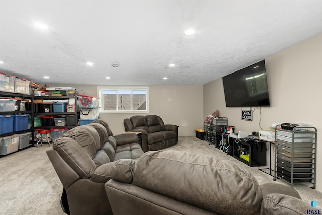 carpeted living area with recessed lighting