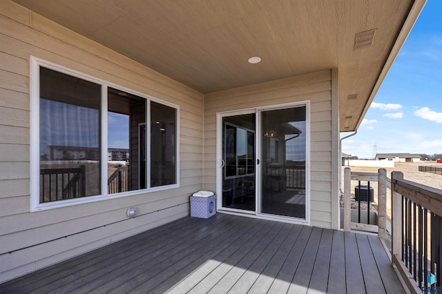 wooden terrace with visible vents