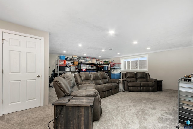 carpeted living area with recessed lighting and ornamental molding