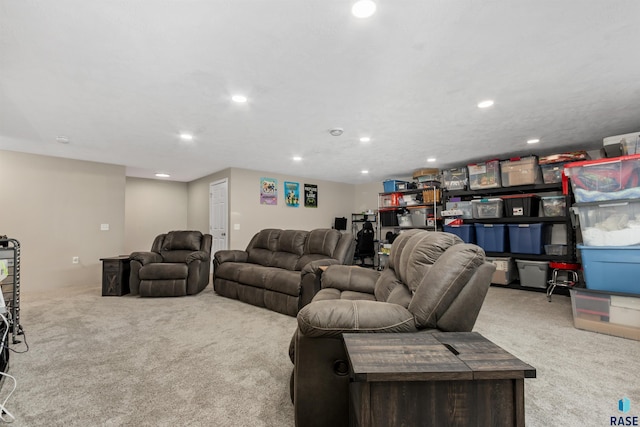 carpeted living area featuring recessed lighting