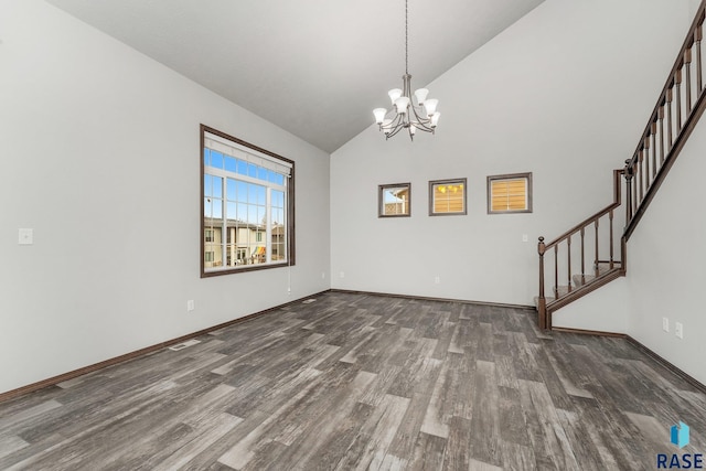 204 E 81st Pl, Sioux Falls, SD 57108 - interior space featuring baseboards, a notable chandelier, wood finished floors, and stairs