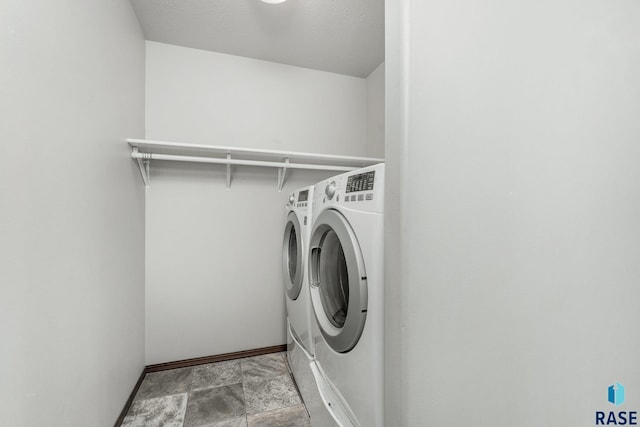 204 E 81st Pl, Sioux Falls, SD 57108 - laundry room featuring laundry area, separate washer and dryer, and baseboards