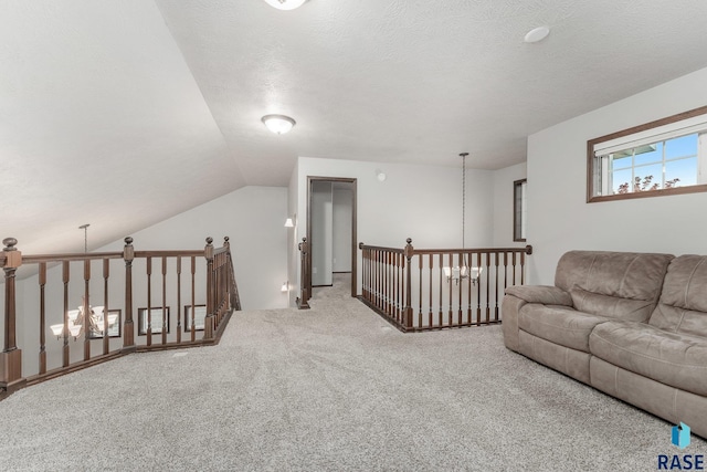 204 E 81st Pl, Sioux Falls, SD 57108 - interior space with carpet, lofted ceiling, an upstairs landing, and a textured ceiling