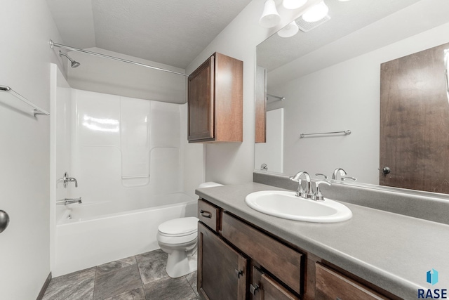 204 E 81st Pl, Sioux Falls, SD 57108 - bathroom featuring vanity, toilet, shower / bathing tub combination, and a textured ceiling