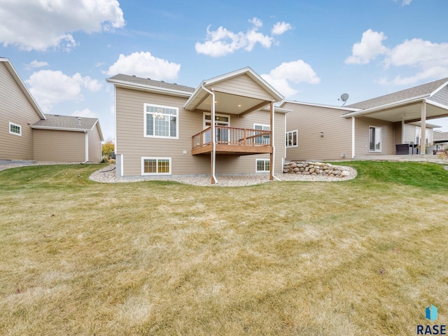 204 E 81st Pl, Sioux Falls, SD 57108 - rear view of house with a wooden deck and a yard