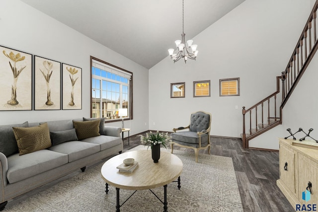 204 E 81st Pl, Sioux Falls, SD 57108 - living room featuring stairway, baseboards, high vaulted ceiling, dark wood-style flooring, and a chandelier