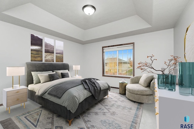 204 E 81st Pl, Sioux Falls, SD 57108 - bedroom with a raised ceiling and light carpet