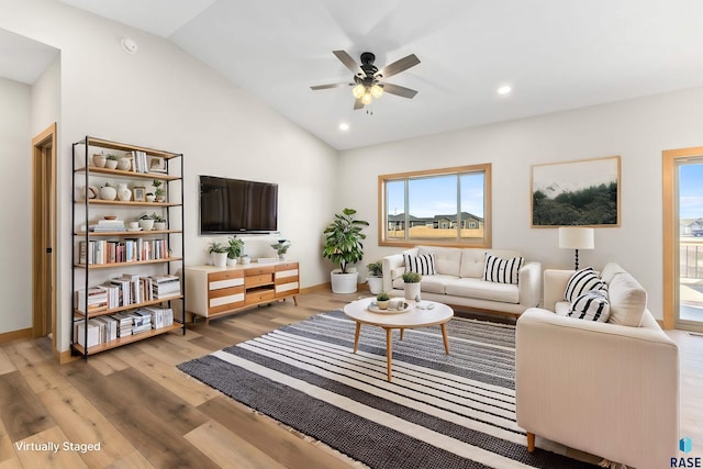 living room featuring recessed lighting, wood finished floors, ceiling fan, and vaulted ceiling