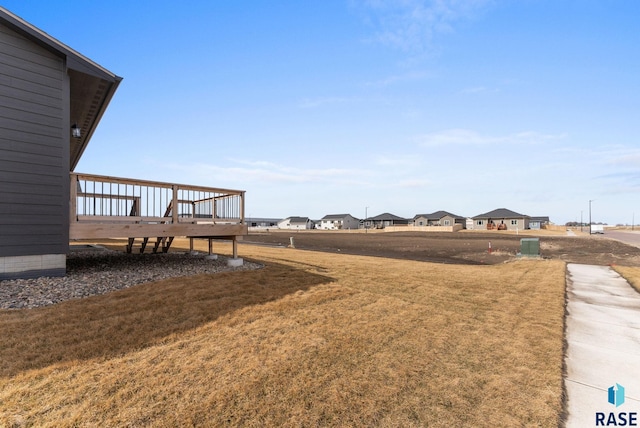 view of yard with a deck