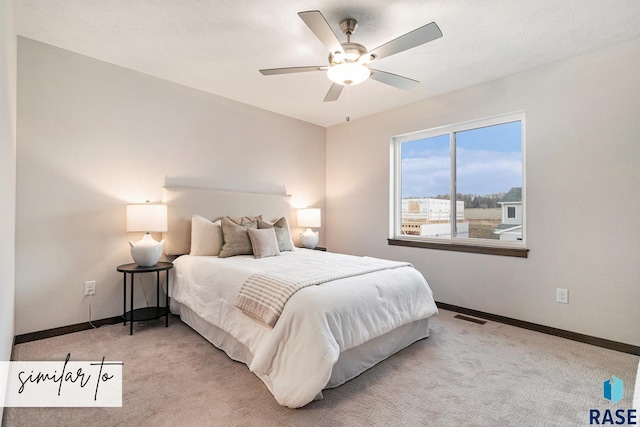 5714 E Avett Pl, Sioux Falls, SD 57108 - bedroom with visible vents, baseboards, light colored carpet, and ceiling fan