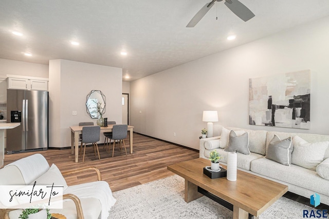 5714 E Avett Pl, Sioux Falls, SD 57108 - living room with a ceiling fan, recessed lighting, light wood-style floors, and baseboards