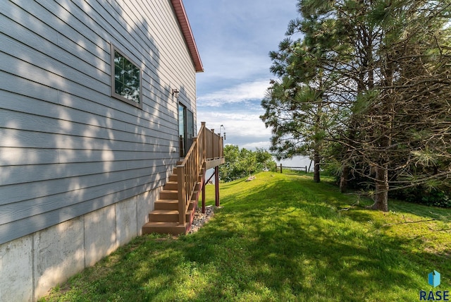 6305 Lakeview Dr, Wentworth, SD 57075 - view of yard featuring stairway and a wooden deck