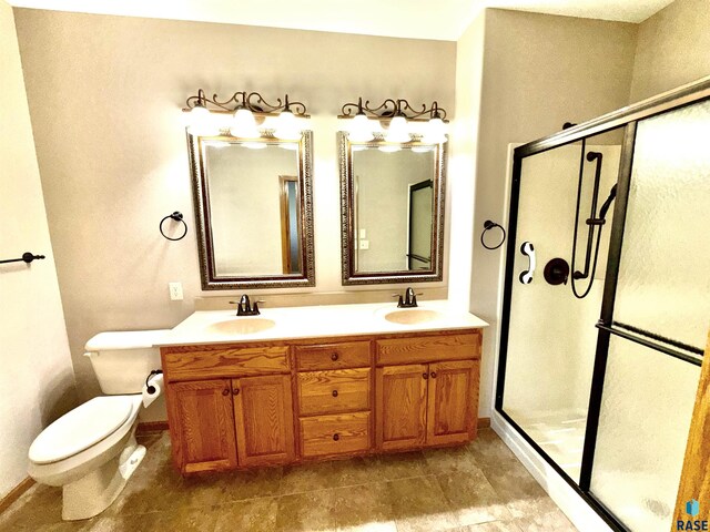 800 W Sterling Oak Cir, Sioux Falls, SD 57108 - bathroom with a shower stall and double vanity