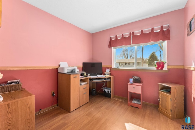 office with baseboards and light wood-type flooring