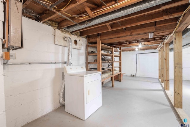 unfinished below grade area with washer / dryer