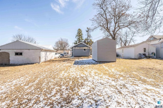 view of yard with an outbuilding and a pole building