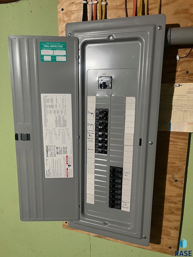 utility room featuring electric panel
