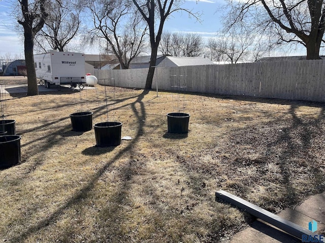 view of yard with fence