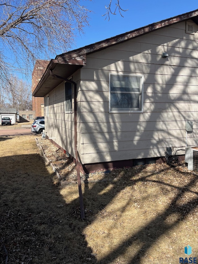 view of home's exterior with central AC