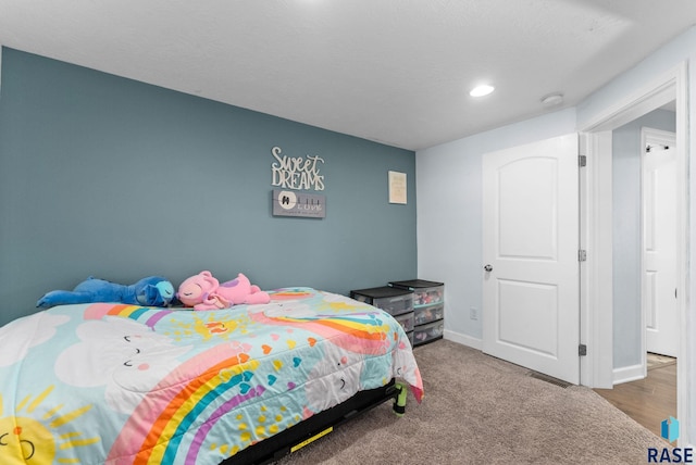 bedroom featuring baseboards