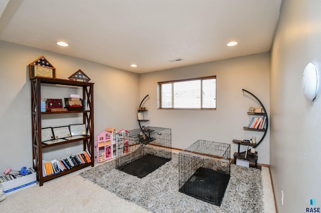 interior space with recessed lighting, carpet, baseboards, and visible vents