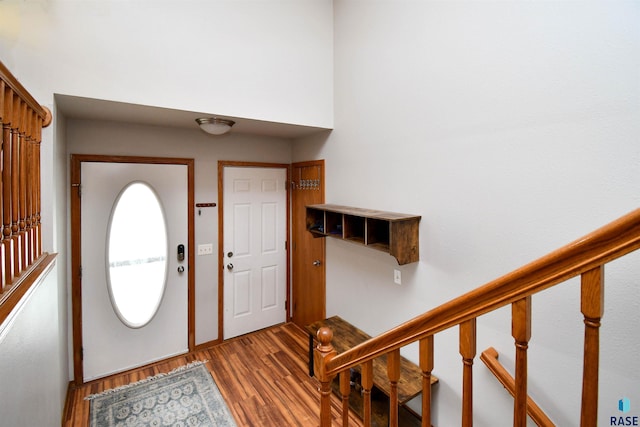 entrance foyer with stairs and light wood-type flooring