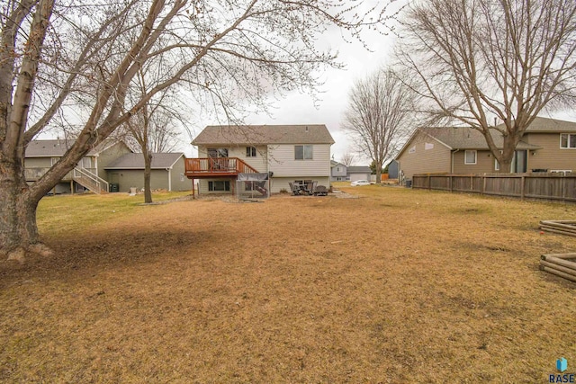 view of yard with stairs and a wooden deck