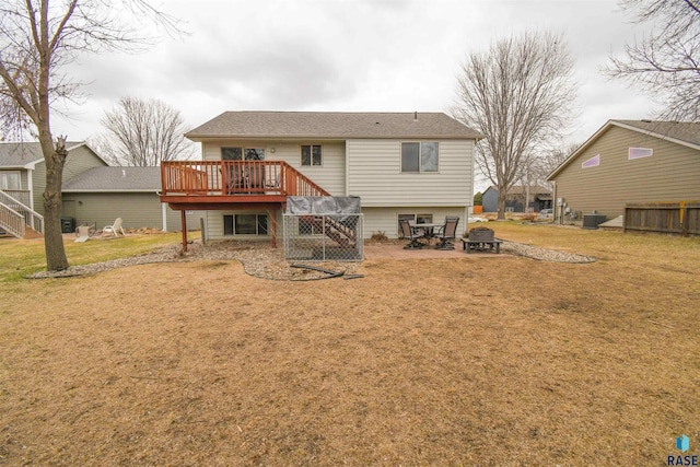 back of property featuring stairs, a patio area, central air condition unit, a deck, and a yard