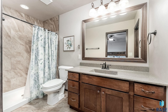 bathroom featuring a shower stall, visible vents, toilet, and vanity