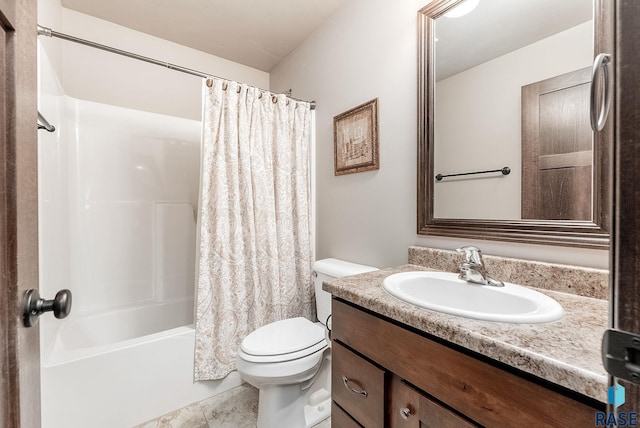 bathroom with toilet, vanity, and shower / tub combo