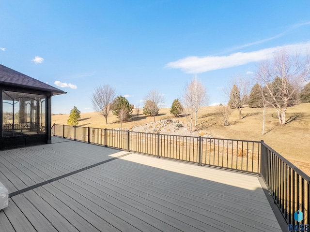 wooden terrace with a sunroom