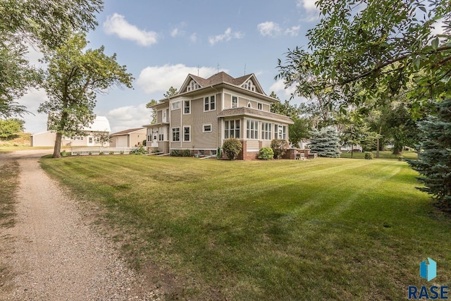 1220 NE 3rd St, Madison, SD 57042 - view of front facade with a front yard