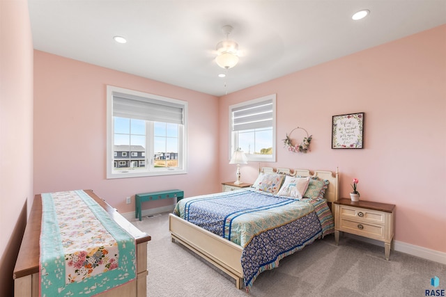 bedroom featuring baseboards, recessed lighting, and carpet