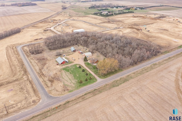 birds eye view of property featuring a rural view