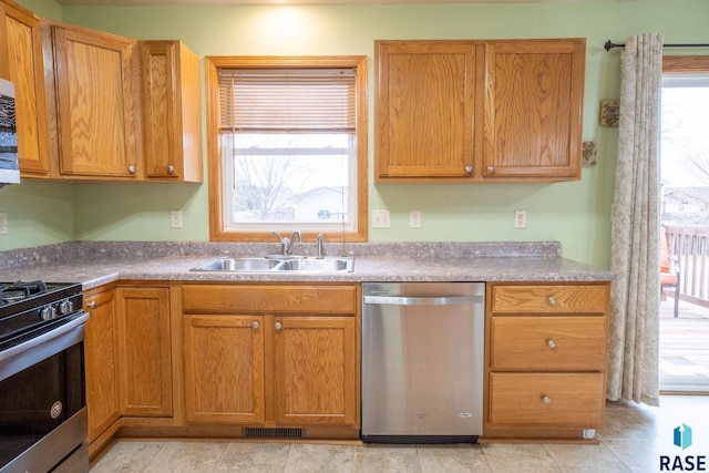 kitchen with a sink, visible vents, and appliances with stainless steel finishes