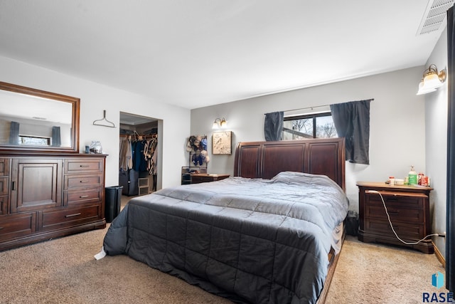 29783 Frog Creek Rd, Centerville, SD 57014 - bedroom featuring a closet, carpet flooring, visible vents, and a walk in closet