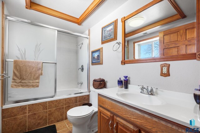 29783 Frog Creek Rd, Centerville, SD 57014 - full bathroom with toilet, tiled shower / bath combo, tile patterned flooring, and vanity