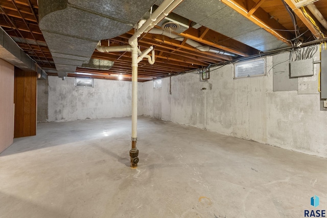 unfinished basement featuring visible vents