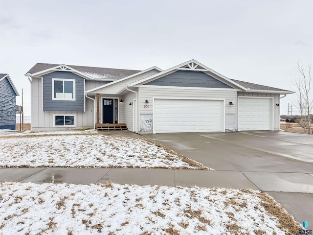 view of front of home featuring driveway and a garage