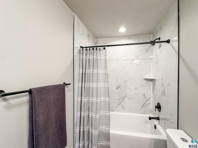 full bath with toilet, shower / tub combo with curtain, and a textured ceiling