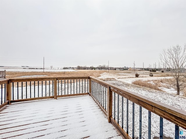 view of snow covered deck