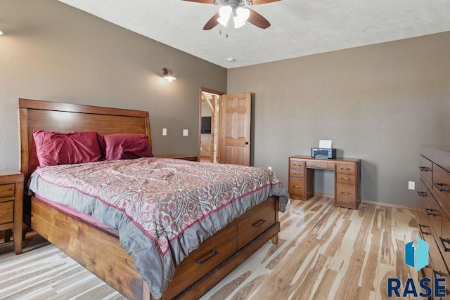 bedroom with baseboards, light wood-style floors, and ceiling fan