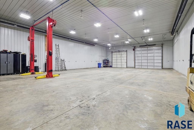 garage featuring metal wall